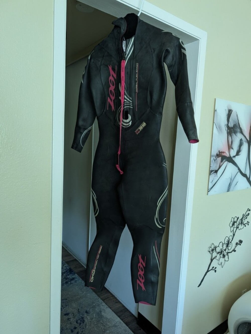 Zoot Black One-Piece Wetsuit with Pink Accents
